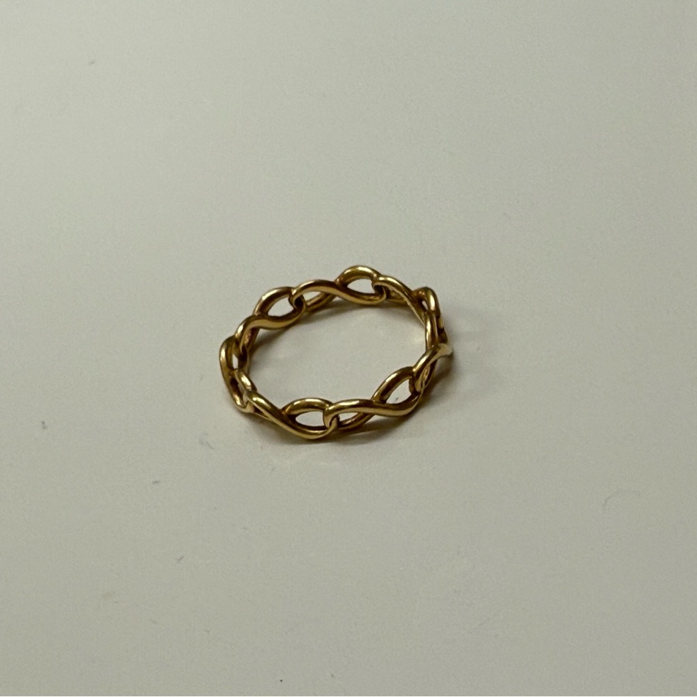 Tiffany & Co. 18k yellow gold infinity ring narrow band, size 6.5